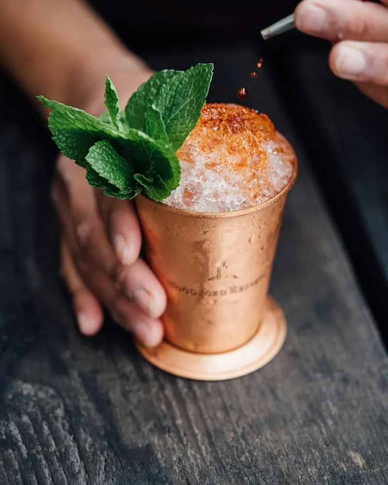 A mint julep in a copper cup